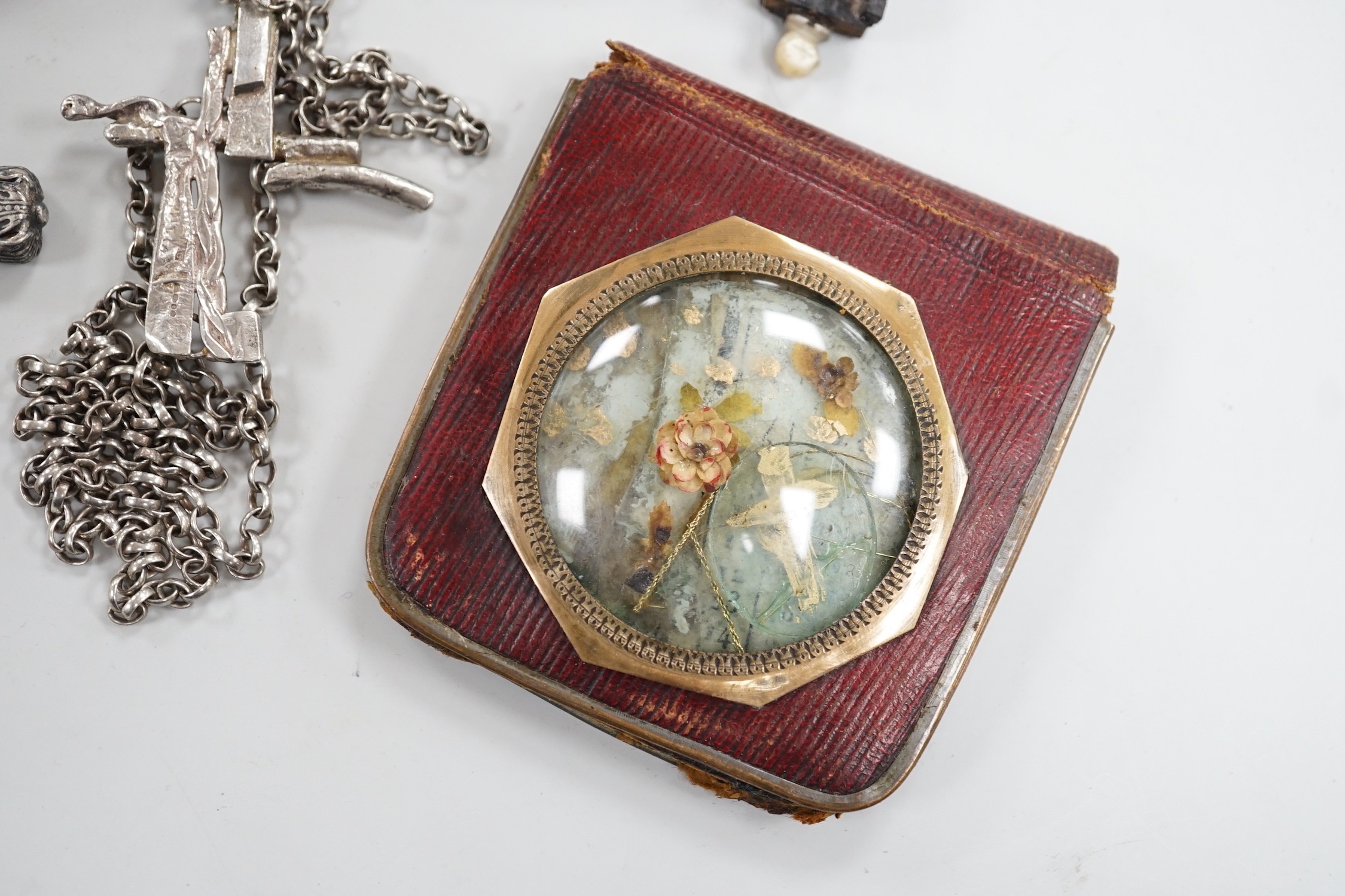A group of catholic related collectables including Corpus Christi, rosary bead holders etc.